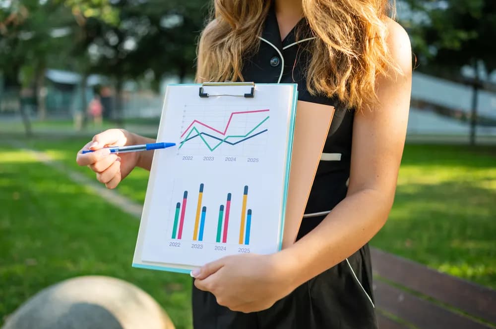 businesswoman-showing-charts-and-statistics-on-cli-2025-06-20-21-15-45-utc_resized